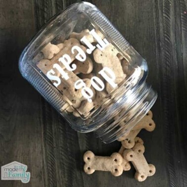 A glass jar of dog treats.
