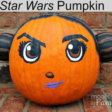 A pumpkin decorated  as Princess Leia.