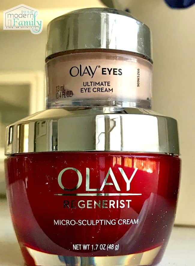 Two jars of Olay skin care.