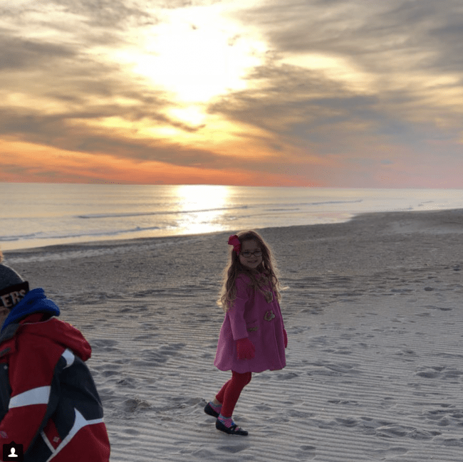 A little girl on a beach.
