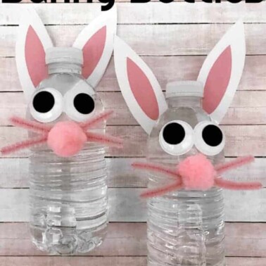 Water bottles decorated to look like bunnies with ears, whiskers and eyes.