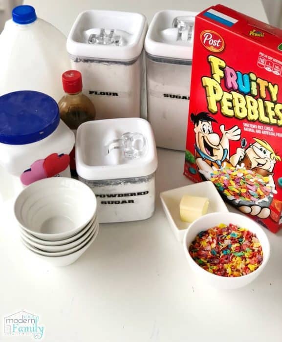 A box of Fruity Pebbles with a variety of ingredients around it.