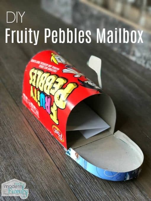 A mail box made out of a Fruity Pebbles cereal box.