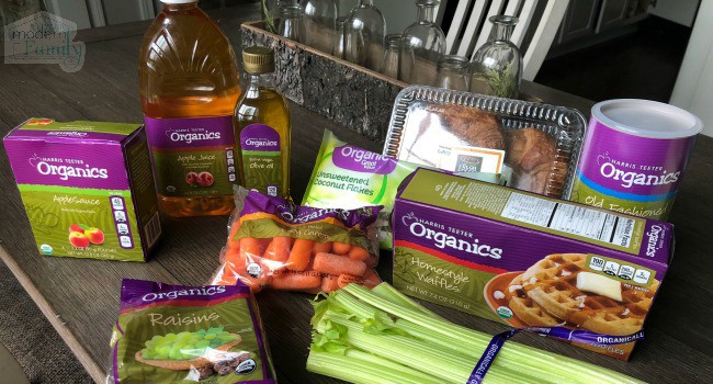 A variety of organic food sitting on a counter.