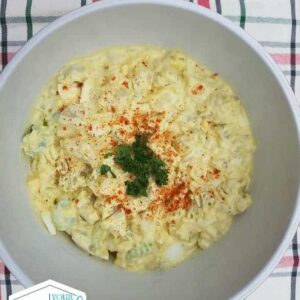A bowl of food on a plate.