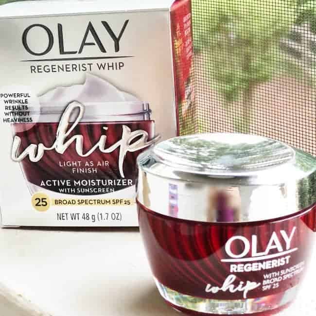 A jar of Olay Regenerist Whip with its box behind it.