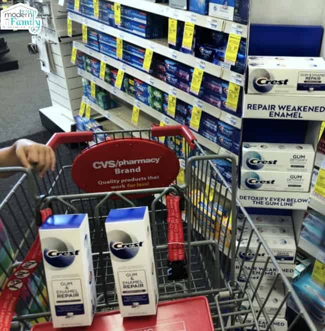 Two boxes of Crest repair in a shopping cart.