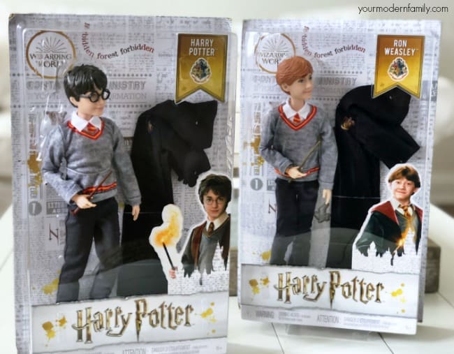 Two sets of Harry Potter figurines in  their original boxes.