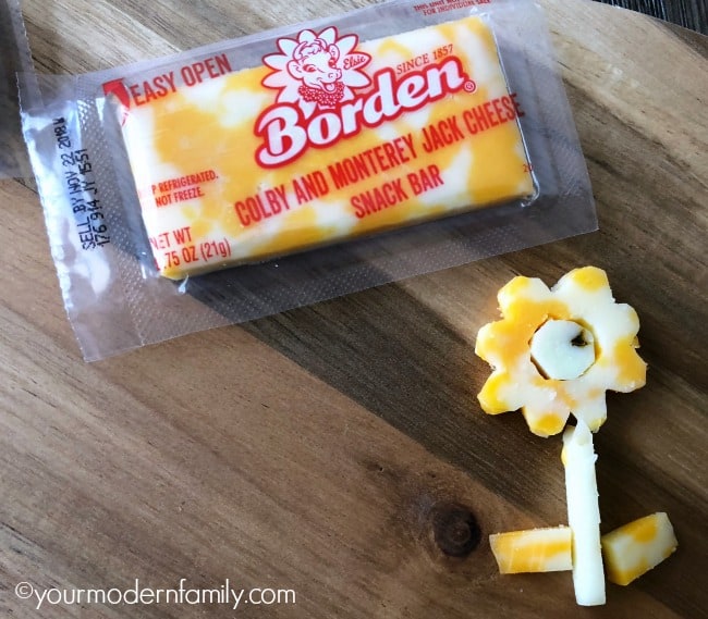 Borden cheesy snack cut out to look like a flower.