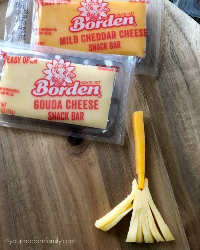 Borden cheesy snack bar cut to look like a witches broom.