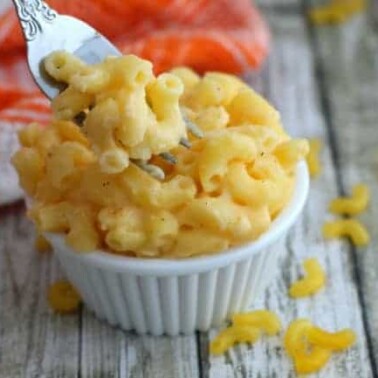 A close up of Macaroni and  Cheese in a small white bowl.