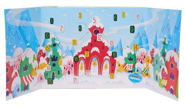 A toy nativity calendar with a winter scene and numbers.