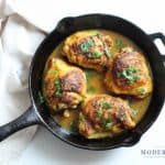A pan filled  with Chicken and sauce.