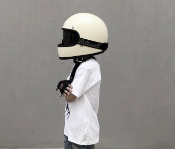 A child wearing a helmet