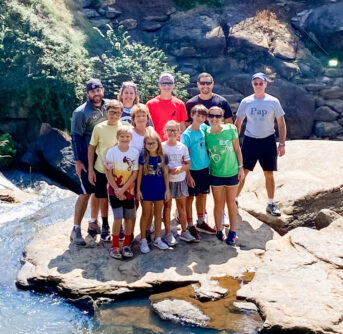 Our family together on a rock after biking
