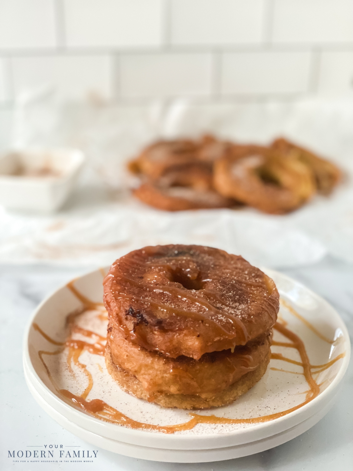 fried caramel apple slices with cinnamon and sugar on top 